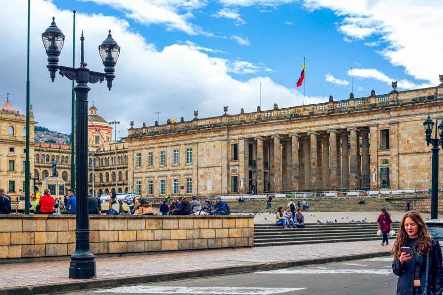 Plaza Bolívar in Bogotá, with the colonnaded Capitolio Nacional and the Colombian flag flying above it