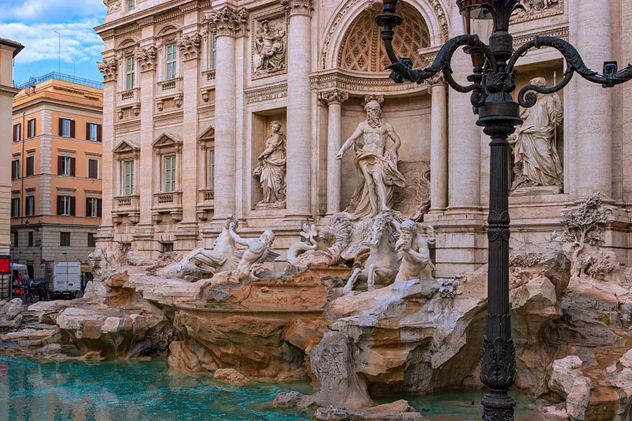 The Trevi Fountain in Rome, with Oceanus and his sea horses above the turquoise basin